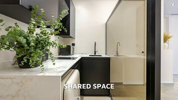Fridge, microwave, stovetop, coffee/tea maker