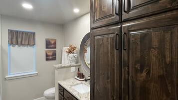 Hair dryer, towels, soap, shampoo