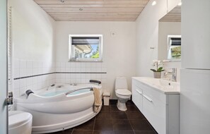 Combined shower/tub