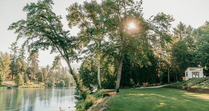 Modern cottage centrally located with private access to the Rogue River!