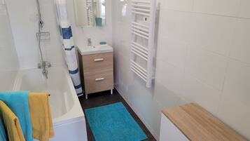 Hair dryer, towels, soap, shampoo