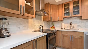 Luxury Condo | Private kitchen | Full-sized fridge, microwave, oven, stovetop