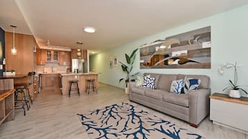 Luxury Condo | Living area | 80-inch Smart TV with cable channels, Hulu, streaming services