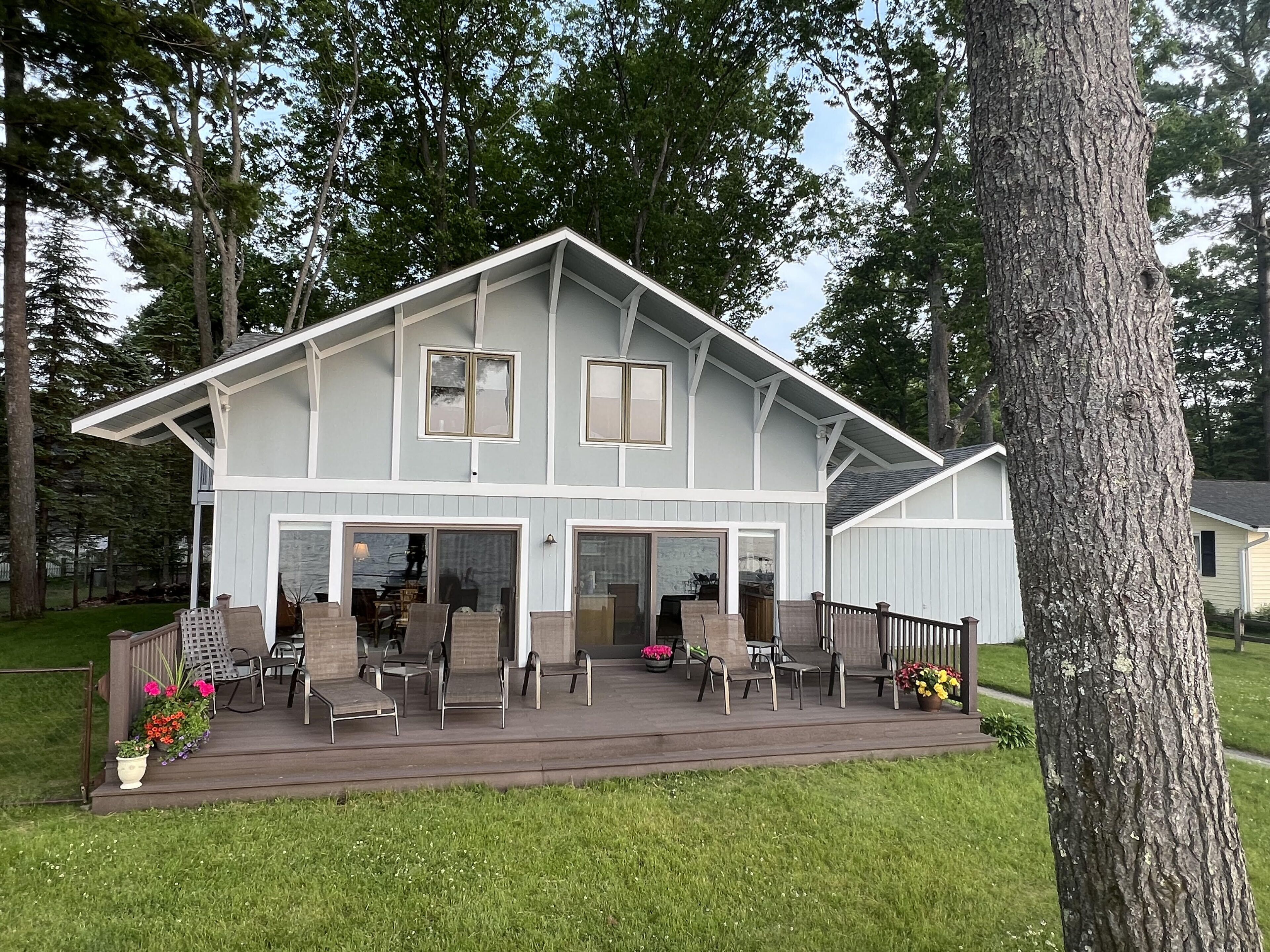 Fantastic Torch Lake home, sandy beach, mile-and-a-half from the sand bar!