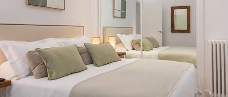 3 habitaciones, tabla de planchar con plancha, wifi y ropa de cama