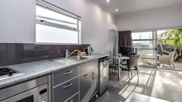 Fridge, microwave, toaster, cookware/dishes/utensils