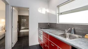 Fridge, microwave, stovetop, coffee/tea maker