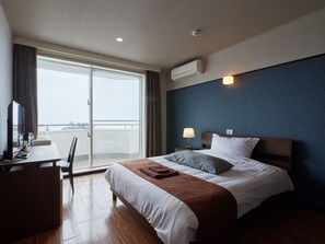 Chambre Double Standard, 1 lit double, non-fumeurs, vue océan | Wi-Fi gratuit, draps fournis