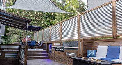 Spacious home near Torch Lake w/custom back patio, steps away from public access