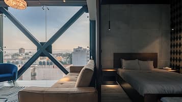Loft Deluxe, 1 cama Queen size, cocineta, vista a la ciudad (4) | 1 habitación, ropa de cama de alta calidad y edredón