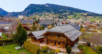 Beautiful wooden log house with sauna and garden