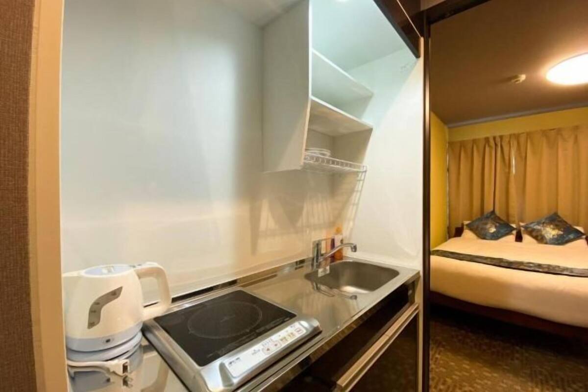 Desk, blackout drapes, WiFi (free), bed sheets