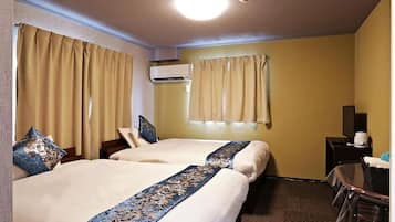 Family Quadruple Room | Desk, blackout drapes, free WiFi, bed sheets