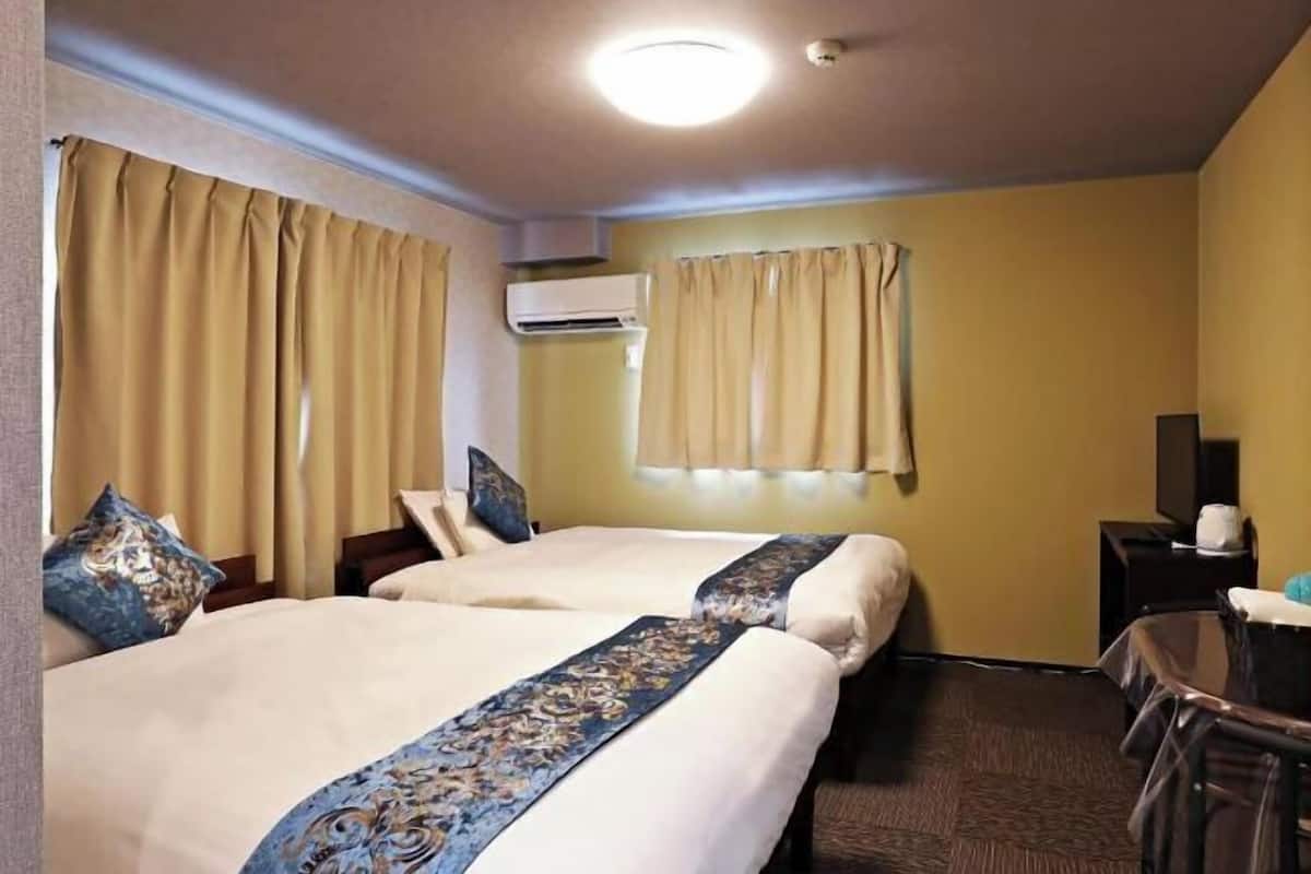Desk, blackout drapes, WiFi (free), bed sheets