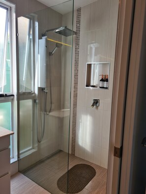 Shower, hair dryer, towels, soap