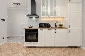 Apartment, 1 Bedroom, Kitchen | Private kitchen | Microwave, dishwasher, electric kettle, cookware/dishes/utensils - Atmospheric Apartment Walicow by Renters (Warsaw)