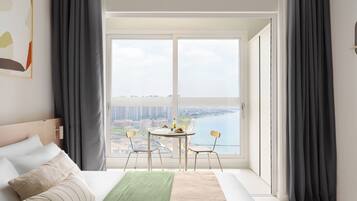 Studio Loft | Hypo-allergenic bedding, desk, laptop workspace, blackout drapes