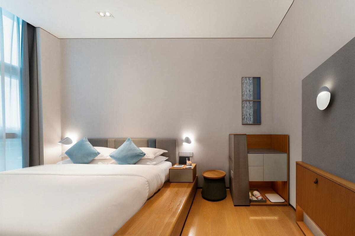 Chambre Confort double | Literie de qualité, couette en duvet