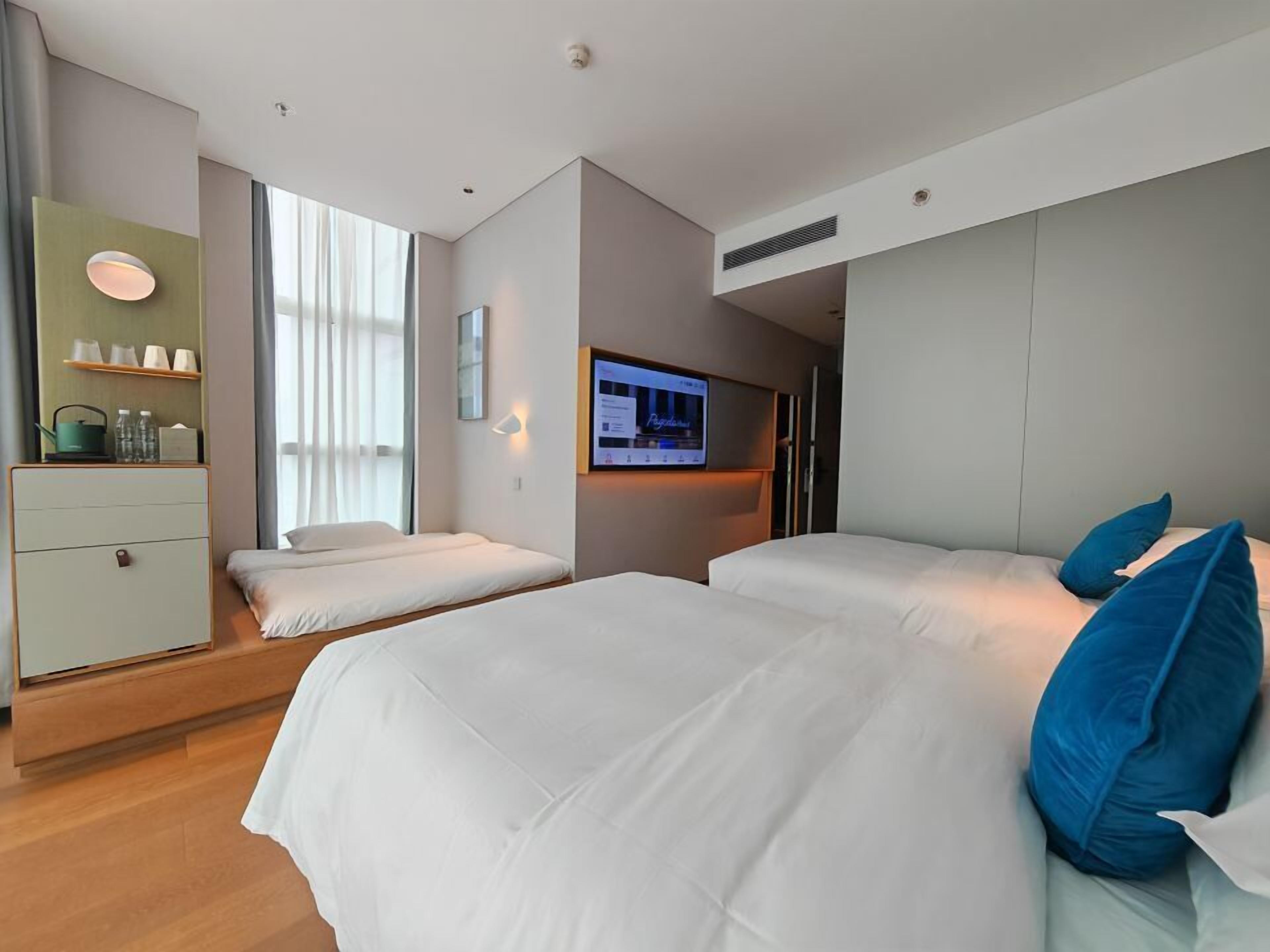 Family Triple Room | Premium bedding, down comforters, memory foam beds, free minibar