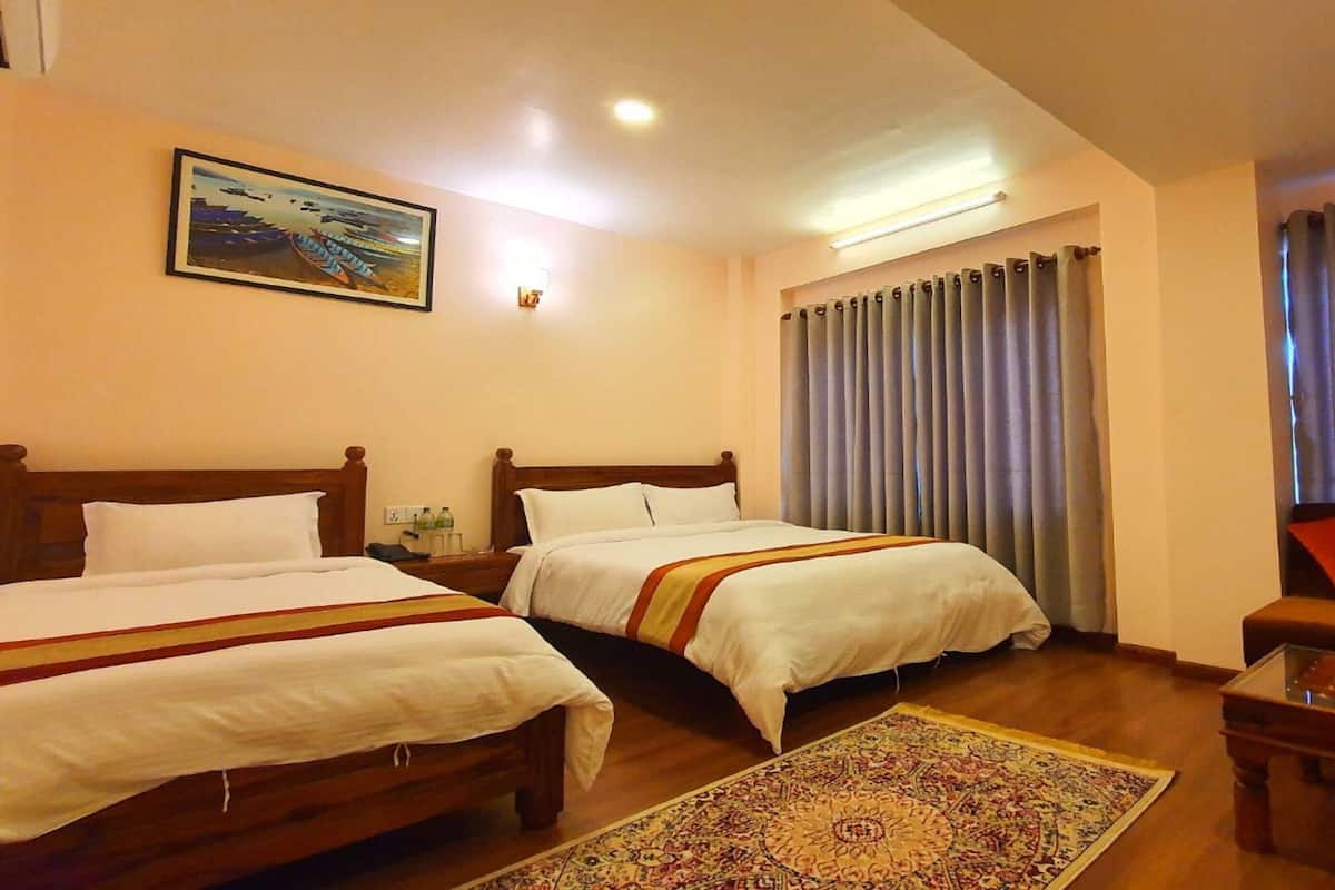 Habitación triple Deluxe | Wifi gratis y ropa de cama