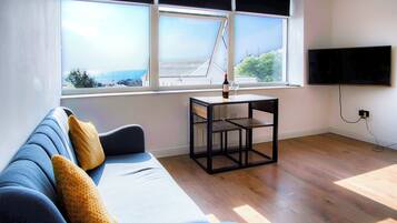 Apartment (1 Bedroom) | Living area | Smart TV