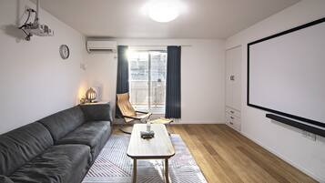 Deluxe Villa | Living area | Smart speakers