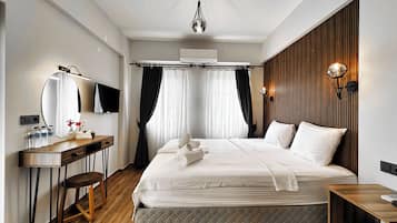 1 habitación, minibar y espacio para trabajar con laptop