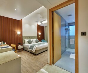 Premium Double Room | Minibar, desk, laptop workspace, iron/ironing board - Regenta Place Raysons Kolhapur  (Kolhapur)