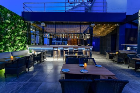 Bar (on property). Regenta Place Raysons Kolhapur