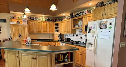 Lakefront home ice fishing snowmobile trail access with beautiful sunrise view