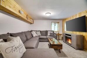 Smart TV, fireplace, foosball