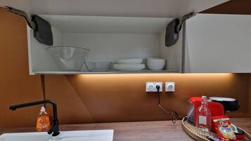 Fridge, microwave, coffee/tea maker, toaster