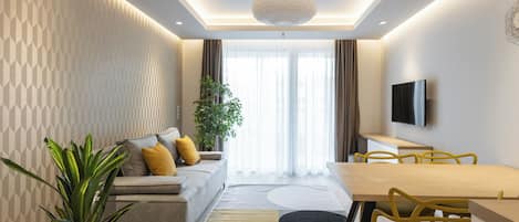 Deluxe Apartment | Living area | Smart TV, streaming services