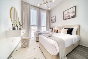 2 chambres, coffres-forts dans les chambres, fer et planche à repasser