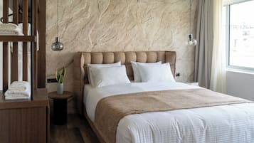 Suíte standard | 1 quarto, camas com colchões de espuma com sistema de memória