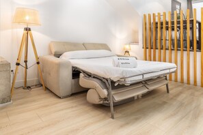 Een strijkplank/strijkijzer, gratis wifi, beddengoed