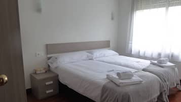 3 dormitorios, tabla de planchar con plancha, wifi gratis y ropa de cama