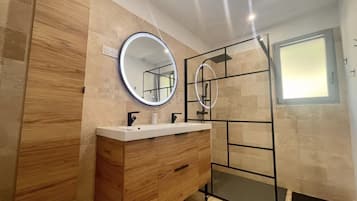 Shower, towels, toilet paper