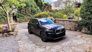 A black SUV parked on a stone driveway in a residential area. - Boutique Family Home, Garden, Parking 3 cars, 2 Living Rooms. Cornwall (Wadebridge)
