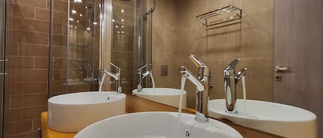 Scorpios | Bathroom | Free toiletries, hair dryer, slippers
