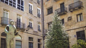 A building with multiple windows and balconies.