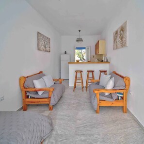 Living area - No:1 Self Catering family apartment short walk to Agathopes, Komito and Fetouri (Posidonia)