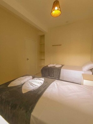 Estúdio clássico | Cofres nos quartos, cortinas blackout, Wi-Fi de cortesia