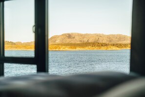 Habitació Deluxe, 1 llit de matrimoni gran, vistes al mar | Escriptori, espai de treball apte per a portàtils i cortines opaques