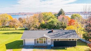 A single-story house with a sloped roof, a front porch, and a garage. - "Come Sail Away"
A charming place in Canandaigua designed with a sailing theme.  (Canandaigua)