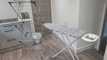 House, Multiple Beds | Bathroom | Combined shower/bathtub, deep-soaking bathtub, towels