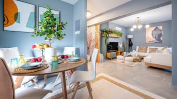 Luxury Apartment, 2 Bedrooms | Living area | 43-inch Smart TV with cable channels