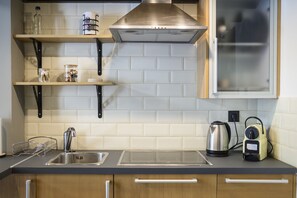 Luxury Apartment | Private kitchen | Mini-fridge, espresso maker, coffee/tea maker, electric kettle