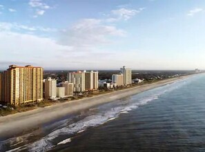 Stunning coastal views of a bustling city's beachfront.
