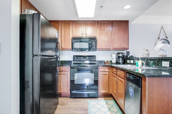 Fridge, microwave, stovetop, coffee/tea maker